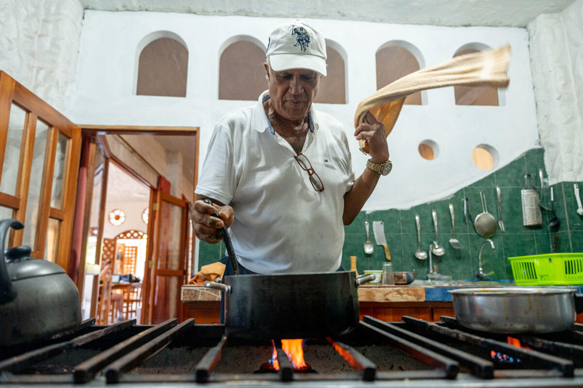Eduardo Veliz prepares his signature fish stew.