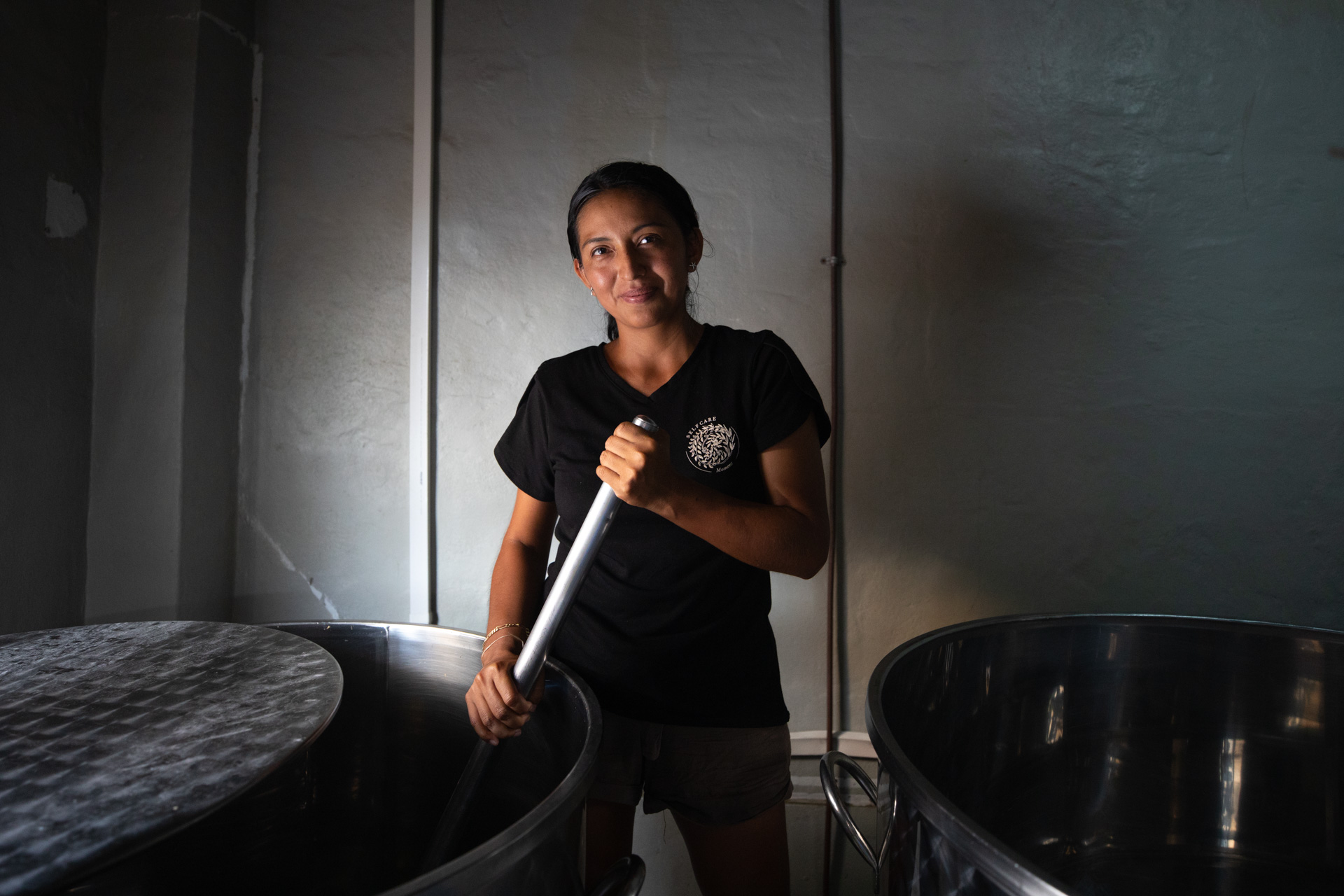 Jenny Quijozaca poses for a portrait inside of the brewery