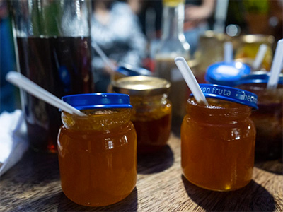 Jars of fruit jam with spoons